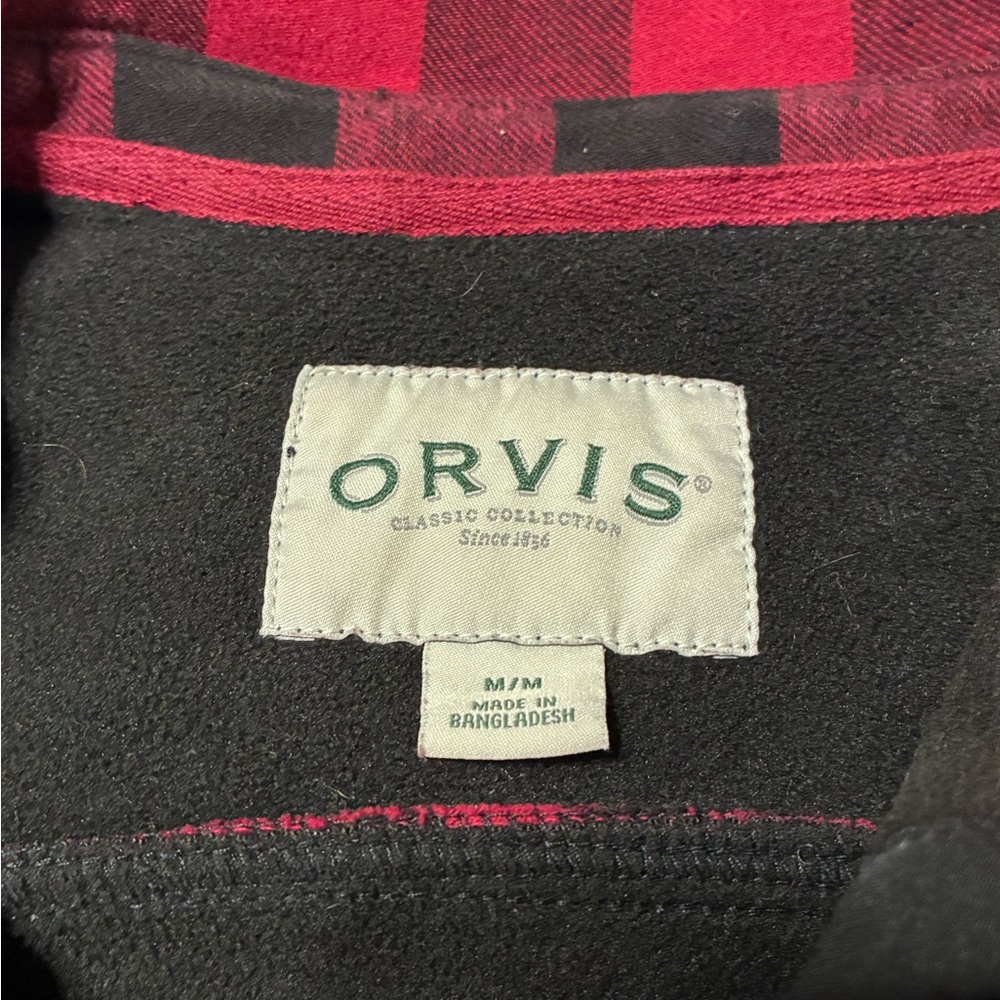 Orvis Black Pullover with Red Plaid Collar Trim